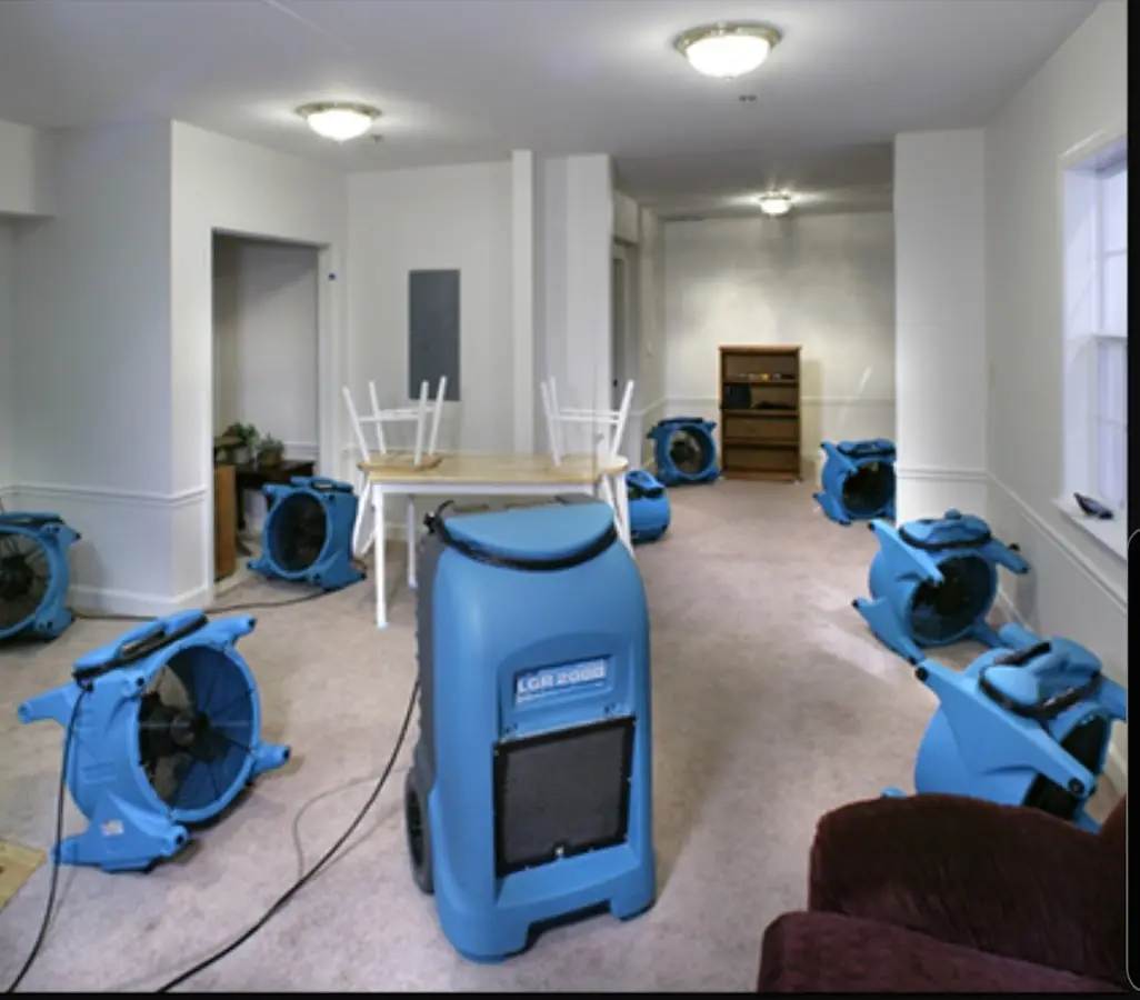 Air movers and dehumidifier setup for Water Damage Restoration in Dinuba